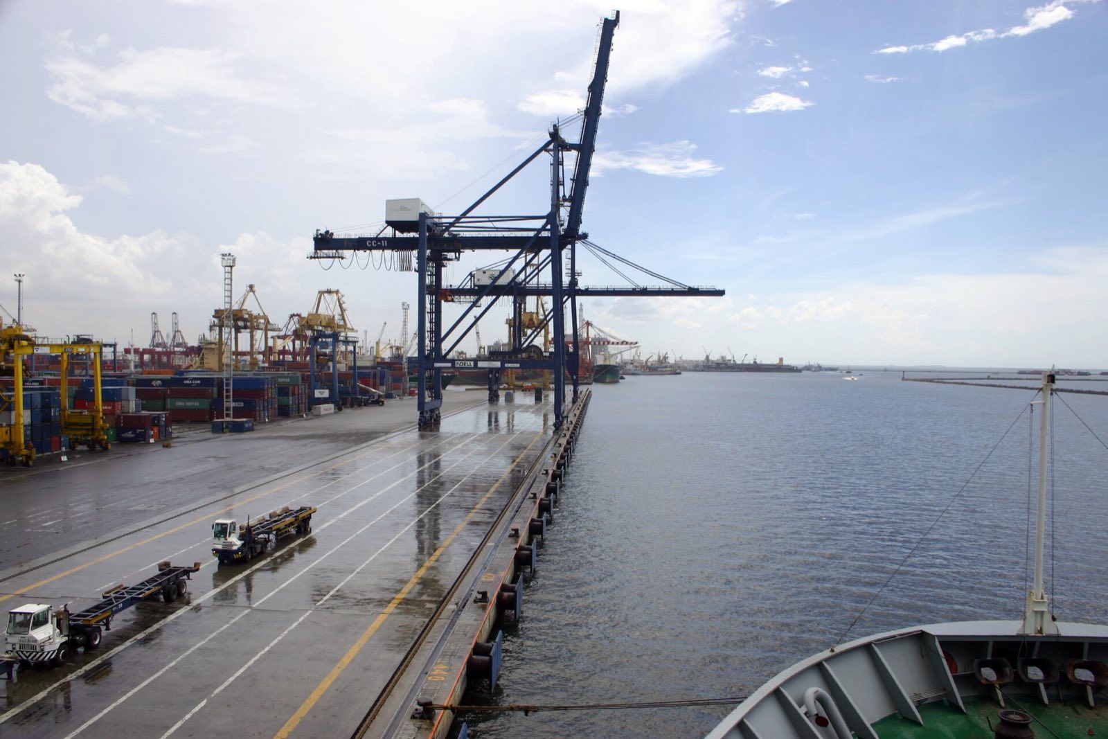Container cranes along the quay at Tanjung Priok, Jakarta